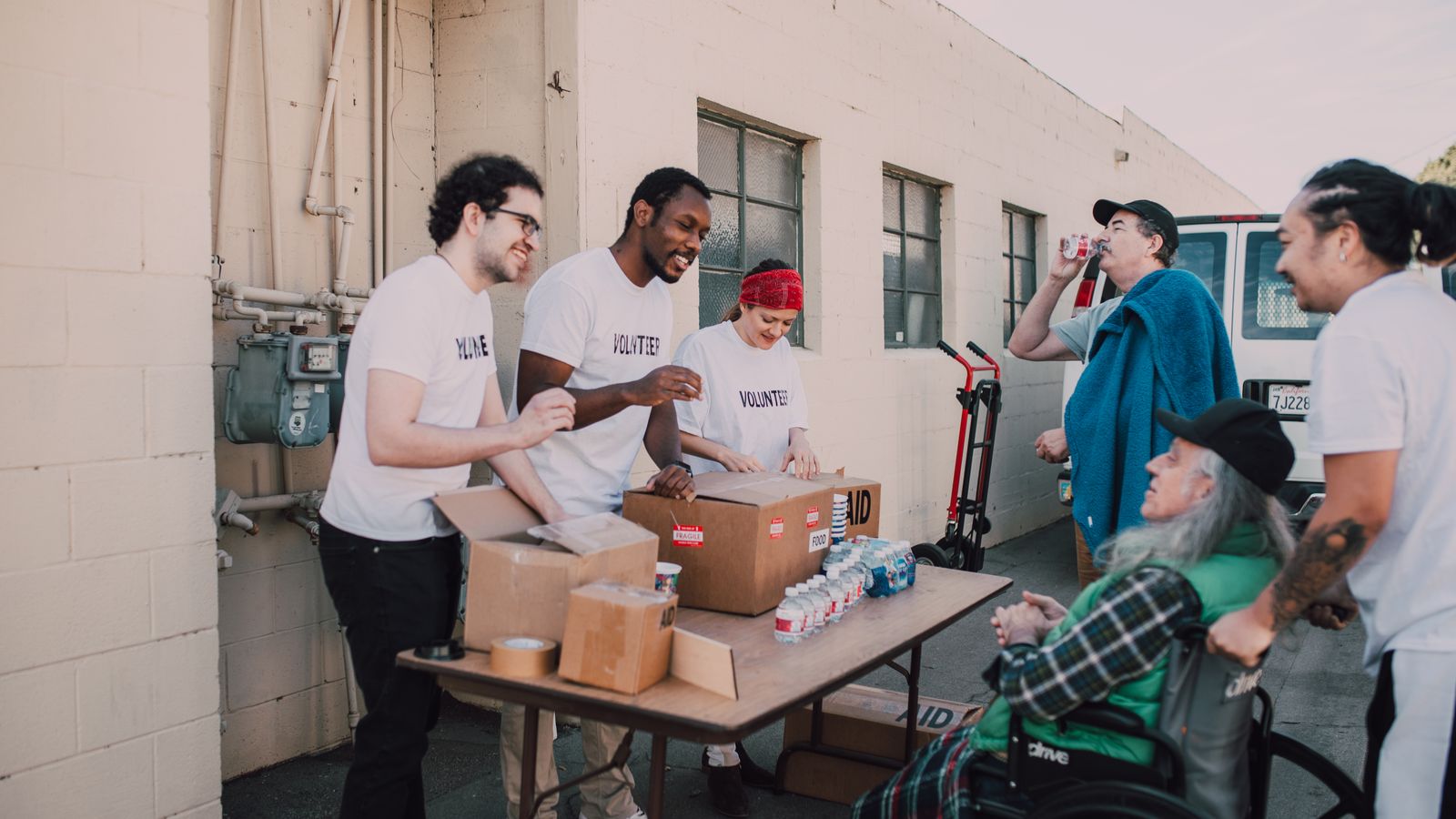 Volunteers sorting supplies at a community organisation