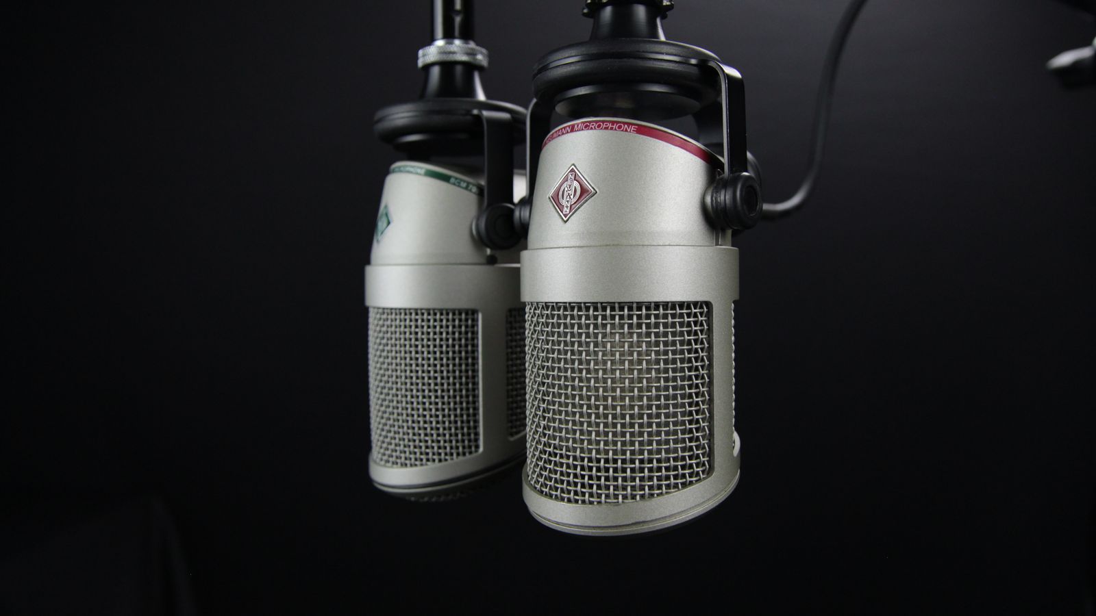 Two studio microphones set up for a political voice over session